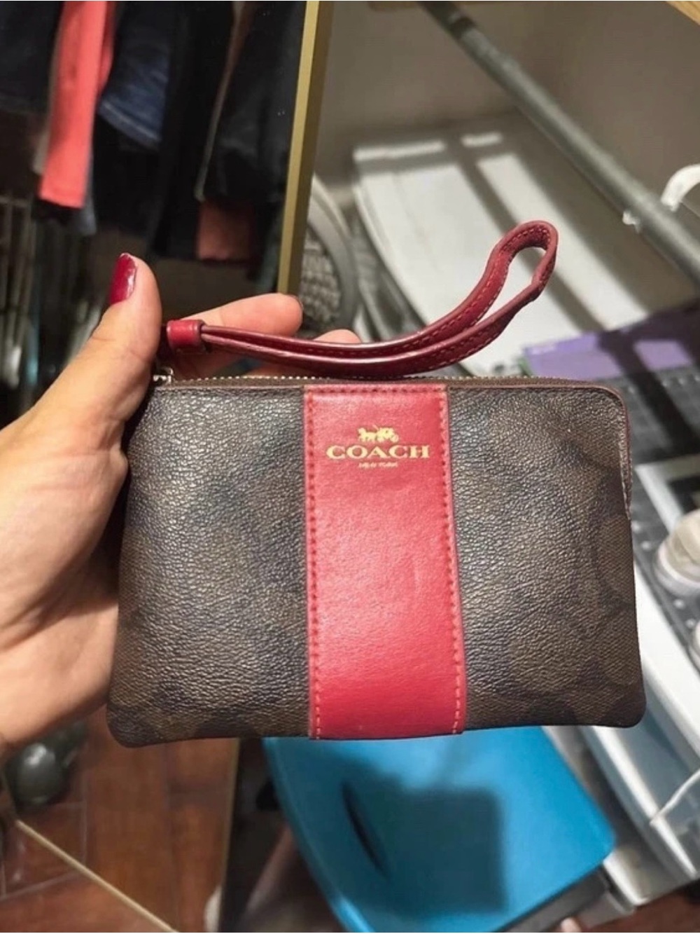 COACH Brown Signature Wristlet with Red Center Stripe